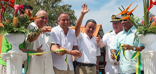 Ricardo Alvarez is joined by other representatives as he opens the new port